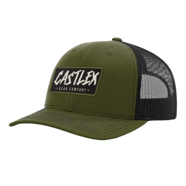 The Ollie Snapback Hat is a green and black trucker hat with a black mesh back and a curved brim. The front displays a rectangular patch with "CASTLEX" in stylized white text, and "GEAR COMPANY" beneath it in smaller font.