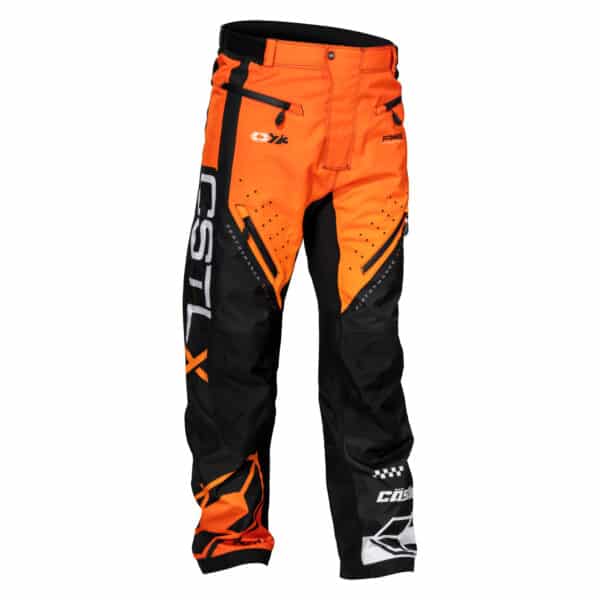 The Men's R25 Race Pant is a pair of bright orange and black motocross pants that feature the branded text "CSTLX" on the left leg. These pants include multiple logos, such as "Cast" near the waist and knee areas. They are designed with button and zipper closures, ventilation holes, and reinforced knee patches for added durability.