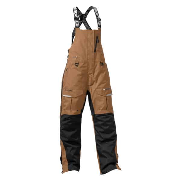 The Women's West Shore Bib features brown and black bib-style overalls with adjustable straps, multiple pockets, and reinforced knee and ankle areas, designed for outdoor or heavy-duty work.